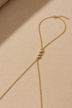 Close-up of Gold Sweetheart Muse hand chain