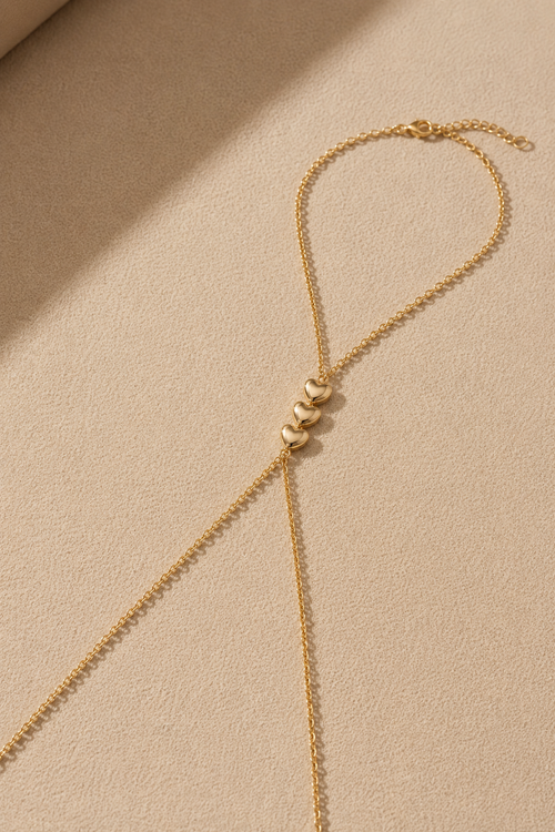 Close-up of Gold Sweetheart Muse hand chain