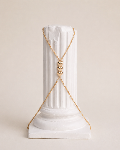 Gold Sweetheart Muse hand chain with heart details